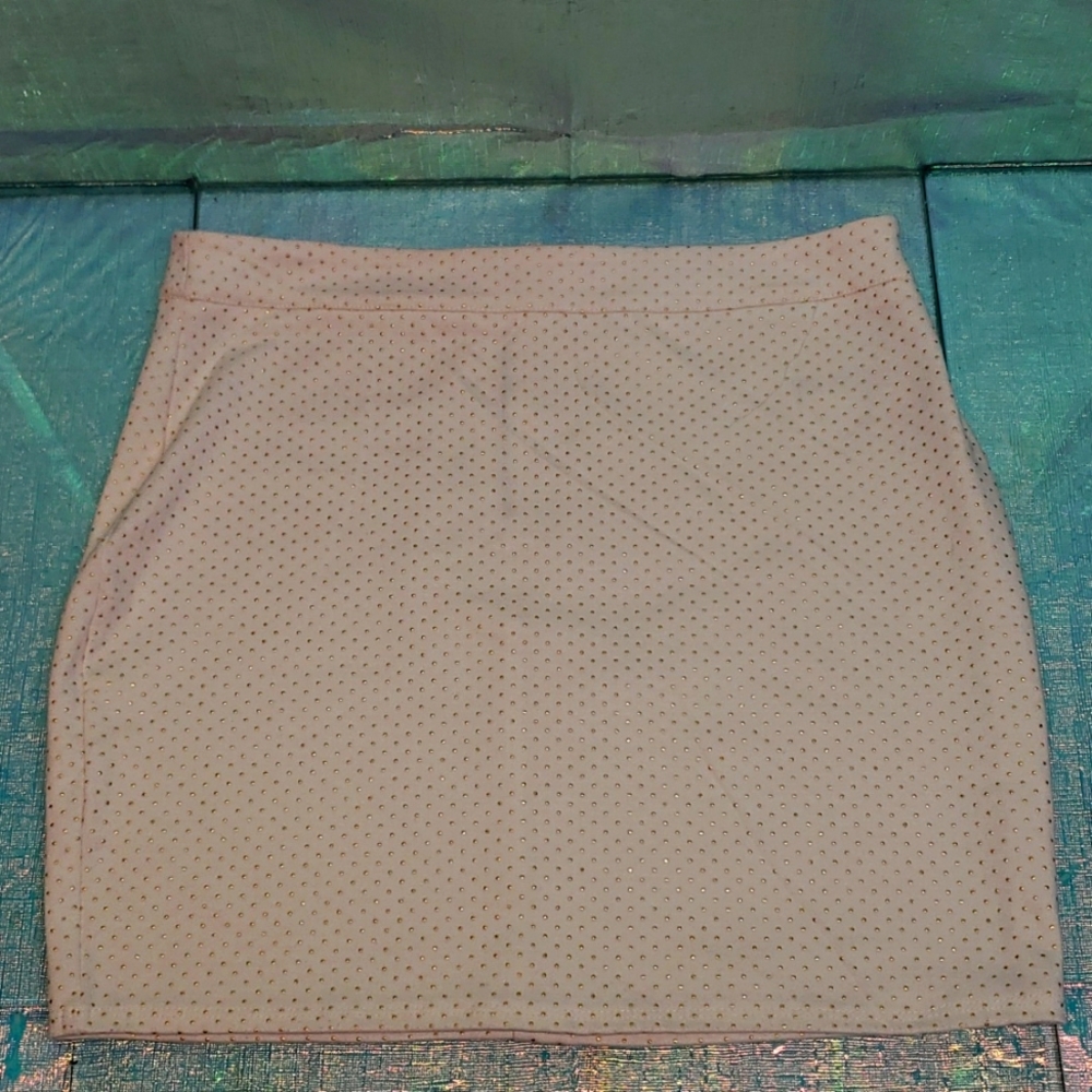 White miniskirt with gold dots. I need better lighting. This is bright white!